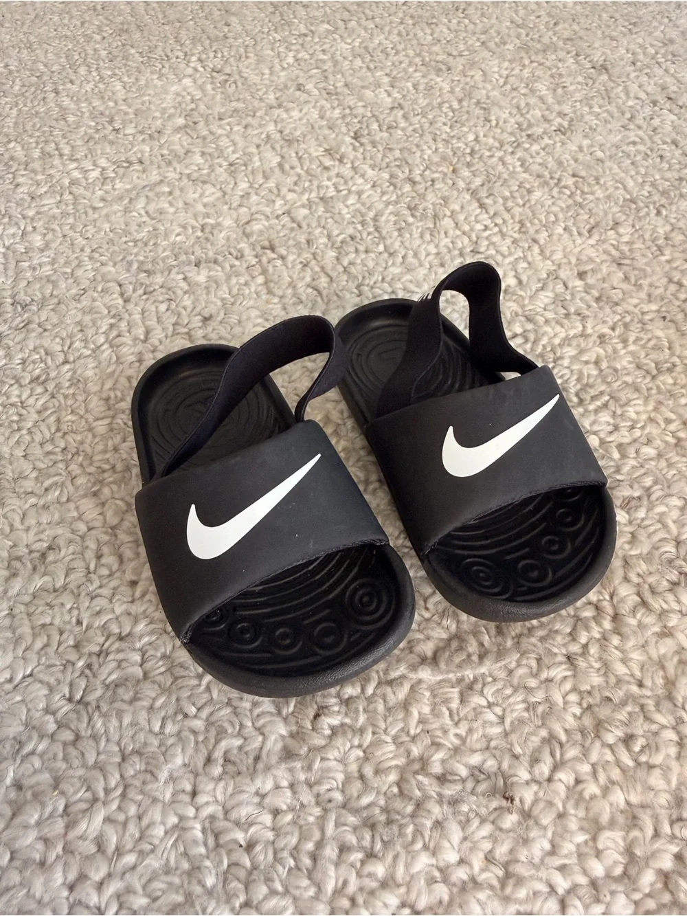 Nike Kids Black Slide Sandals with White Swoosh and Heel Strap